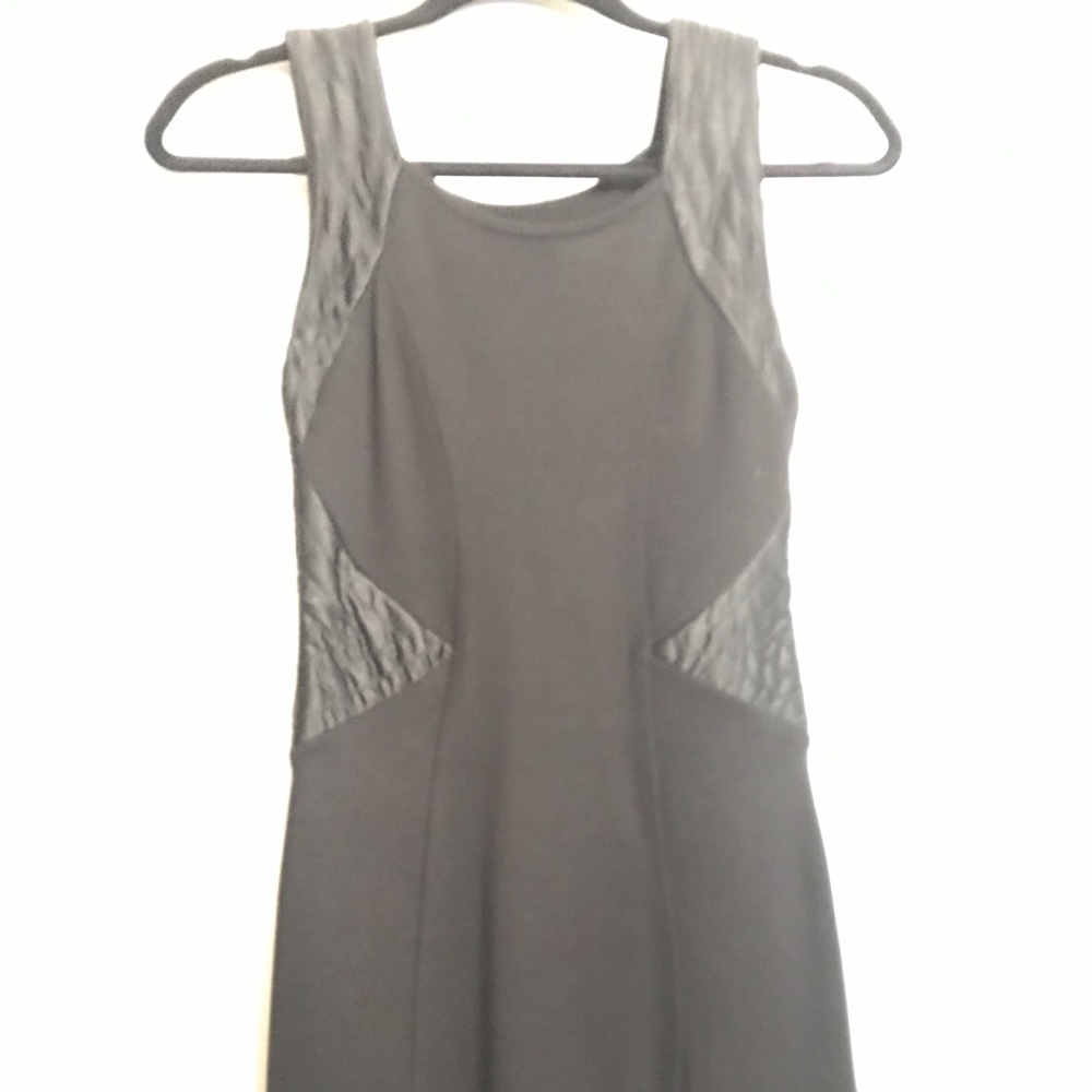 Black form-fitting Bodycon Dress, H&M.